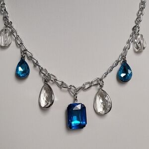 Elegant Silver Necklace with Blue and Clear Charms